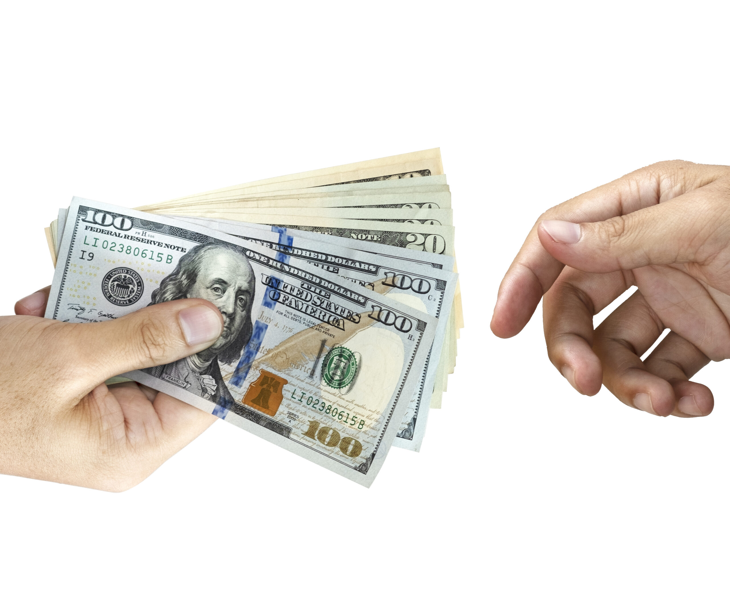 two hands reaching out to each other holding money